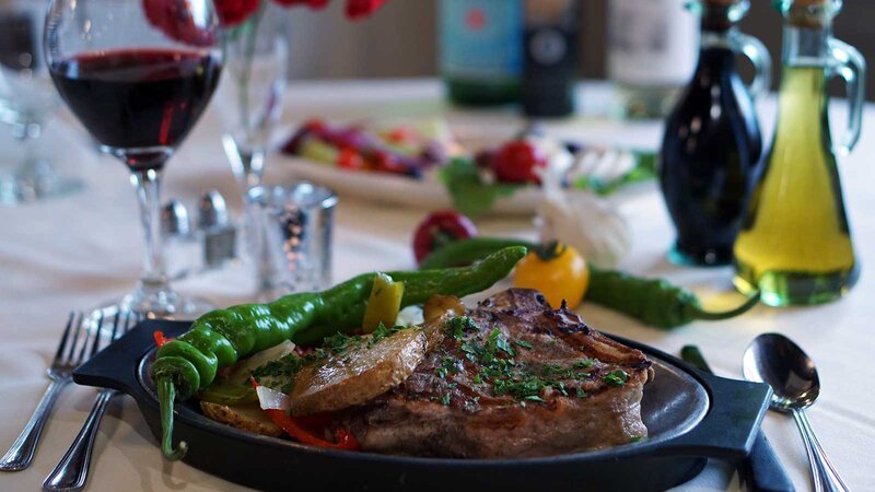 Steak entree with side of green pepper